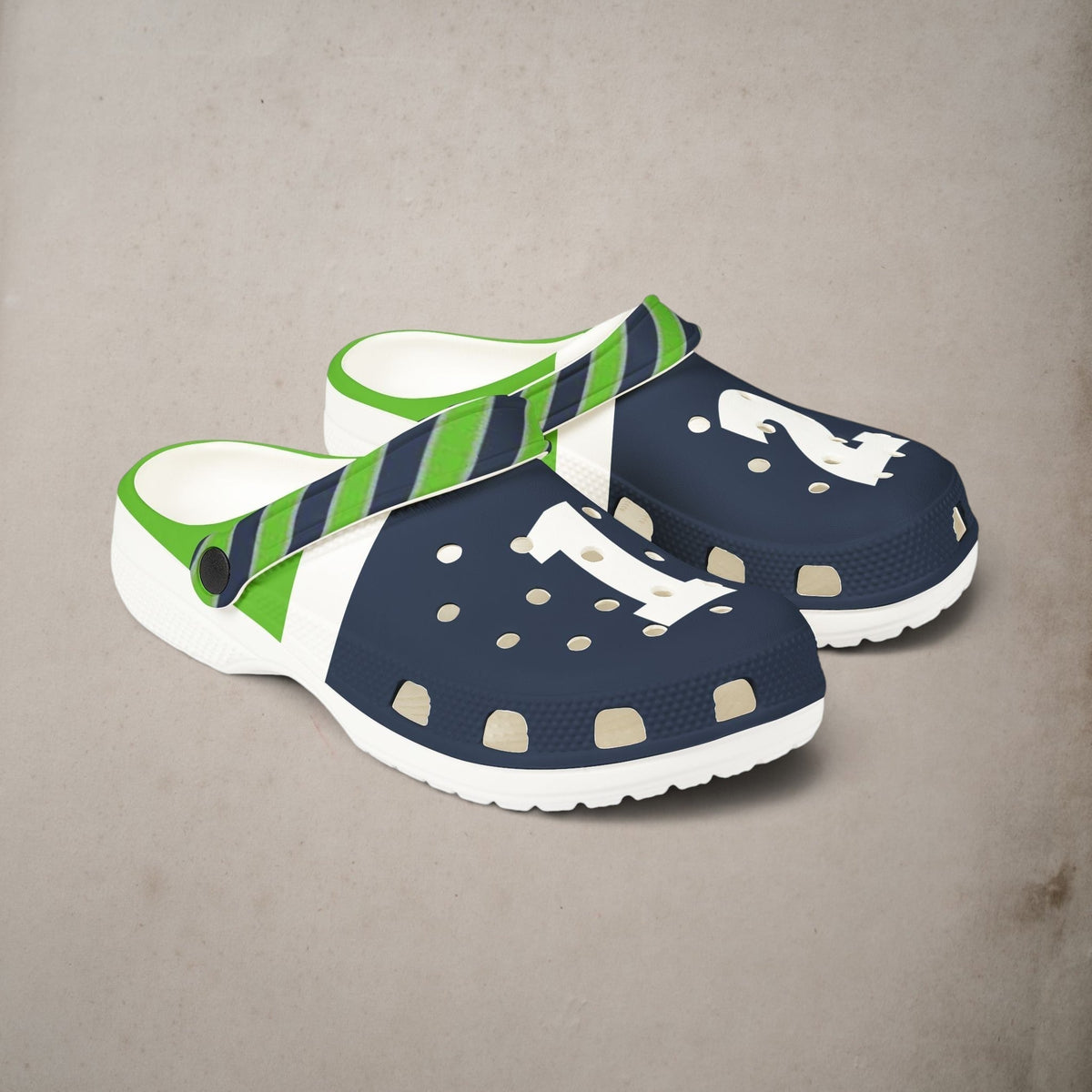 Seattle Seahawks fan clogs in navy, neon green, and white with a 12 graphic and striped heel strap.